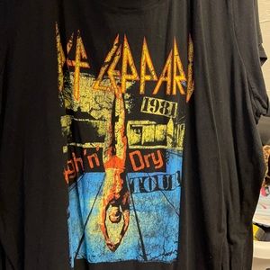Def Leppard T-shirt.